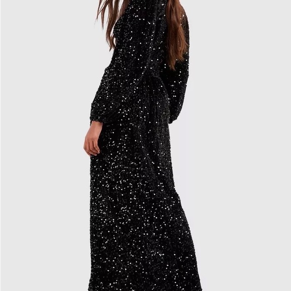 Sequin Ruffle, with ring detail black maxi dress. - Picture 2 of 3